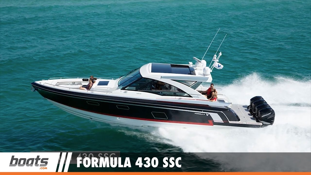 Formula 430 SSC express cruiser running at high speed on the water, showing the powerful quadruple outboard engines.